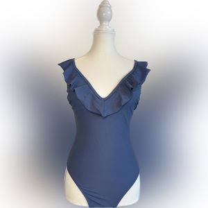 Xhilaration blue ruffled v-neck one piece swimsuit. Size M.